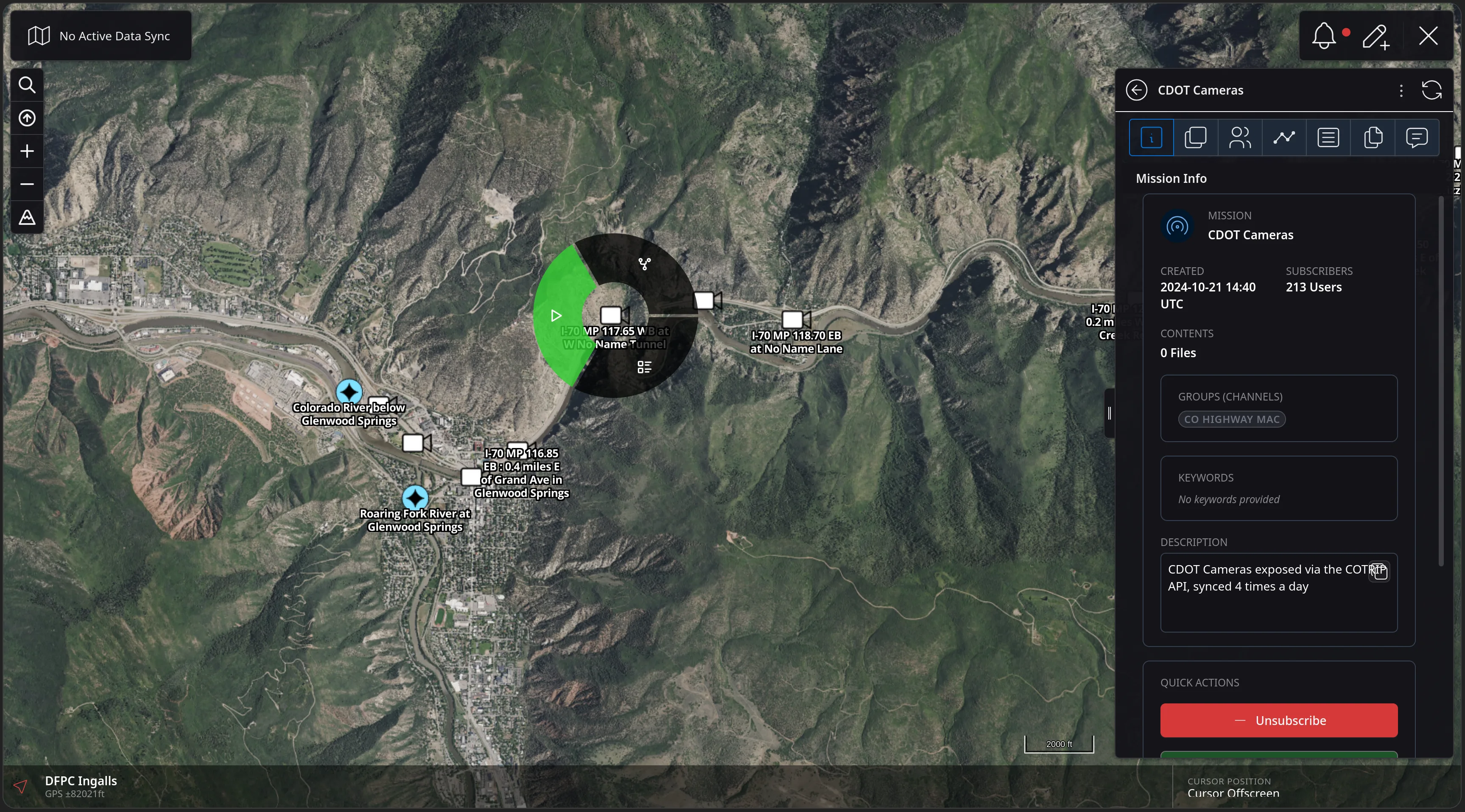 A radial context menu opened on an I-70 camera marker on the CloudTAK map, with a highlighted green play segment alongside the other feature actions.